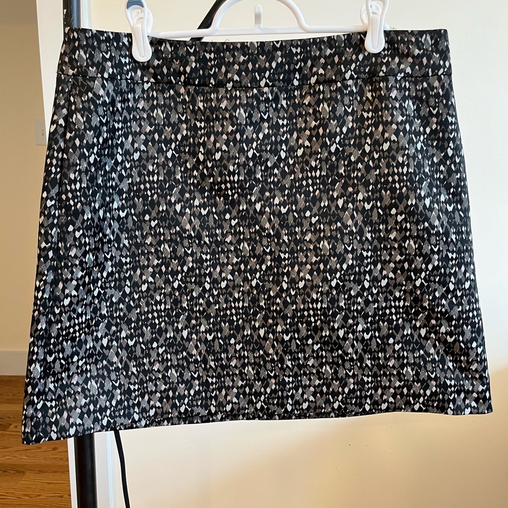 DKNY mini skirt. Zipper on back.